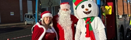 Santa visits Arrowe Park Hospital on grotto bus