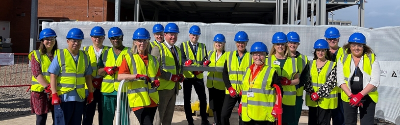 Beam signing ceremony marks A&E build milestone Beam signing ceremony marks A&E build milestone