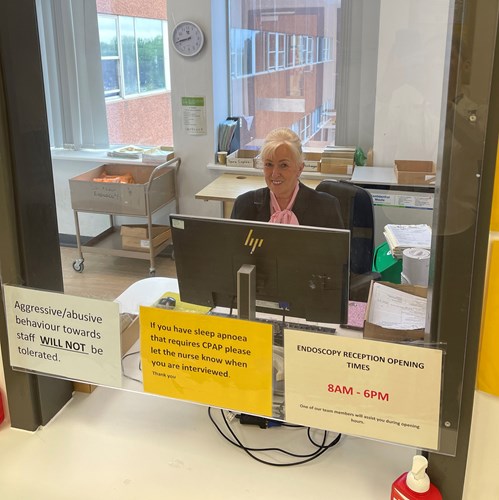 WUTH Endoscopy Reception Staff - Photo of Bernadette at the Reception Cubicle